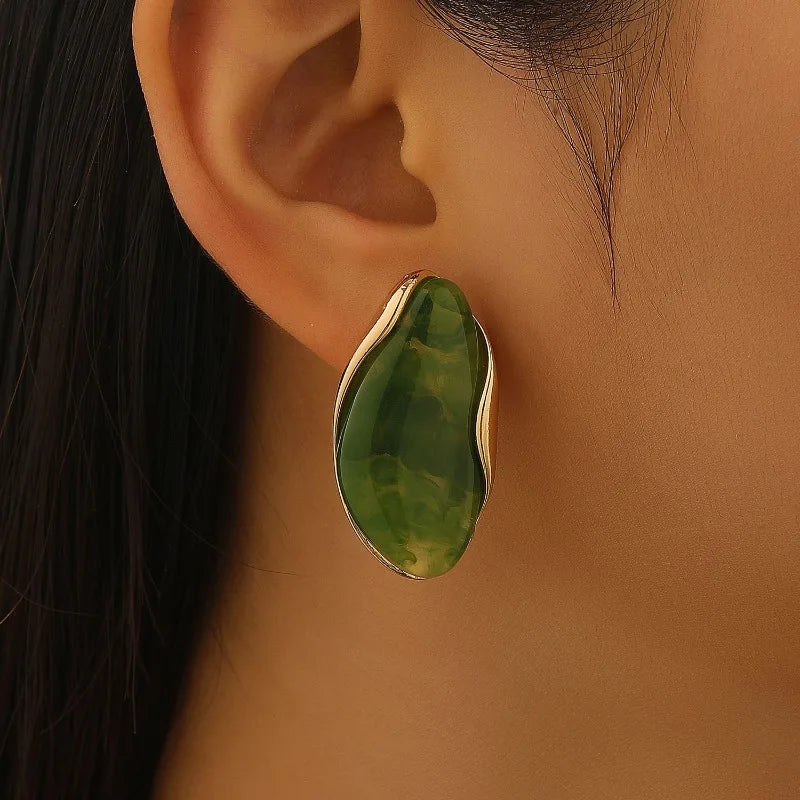 Aretes de Aleación y Resina tipo stud y anillos.