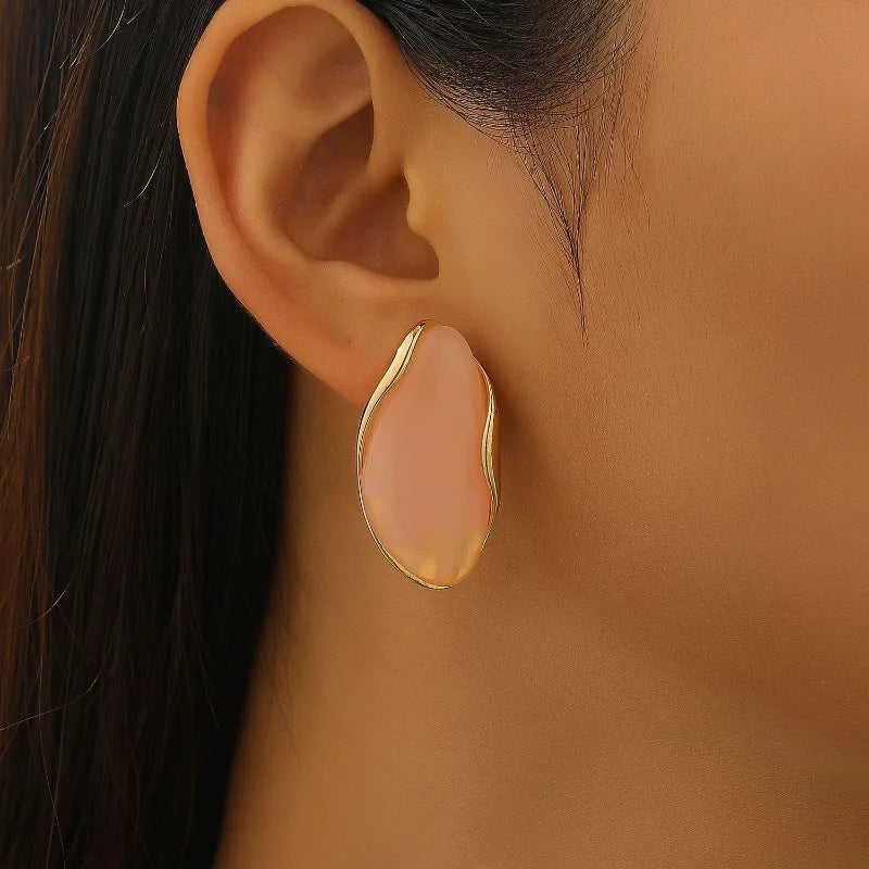 Aretes de Aleación y Resina tipo stud y anillos.